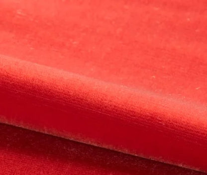 Close-up of red fabric with a textured surface
Velours Uni – Luxury Silk Fabric -Feu