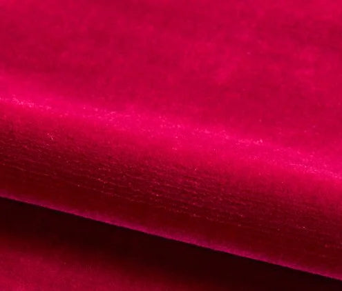 Close-up of a textured red fabric surface
Velours Uni – Luxury Silk Fabric - Rubis