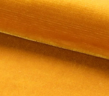 Close-up of yellow velvet fabric with a soft texture
Velours Uni – Luxury Silk Fabric - Topaze