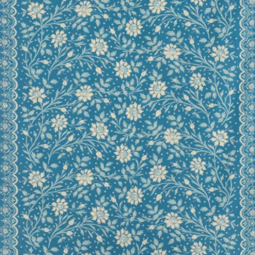 Floral pattern with white flowers on a blue background
Batik Printed Cotton, Bleu