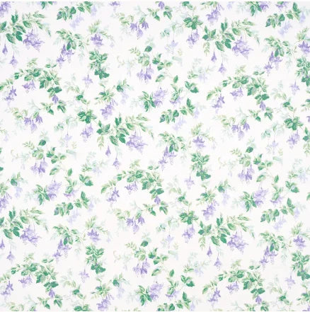 Floral pattern with purple flowers and green leaves on a white background
Garden Gate Chintz Fabric - Lavender