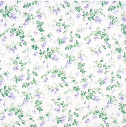 Floral pattern with purple flowers and green leaves on a white background
Garden Gate Chintz Fabric - Lavender